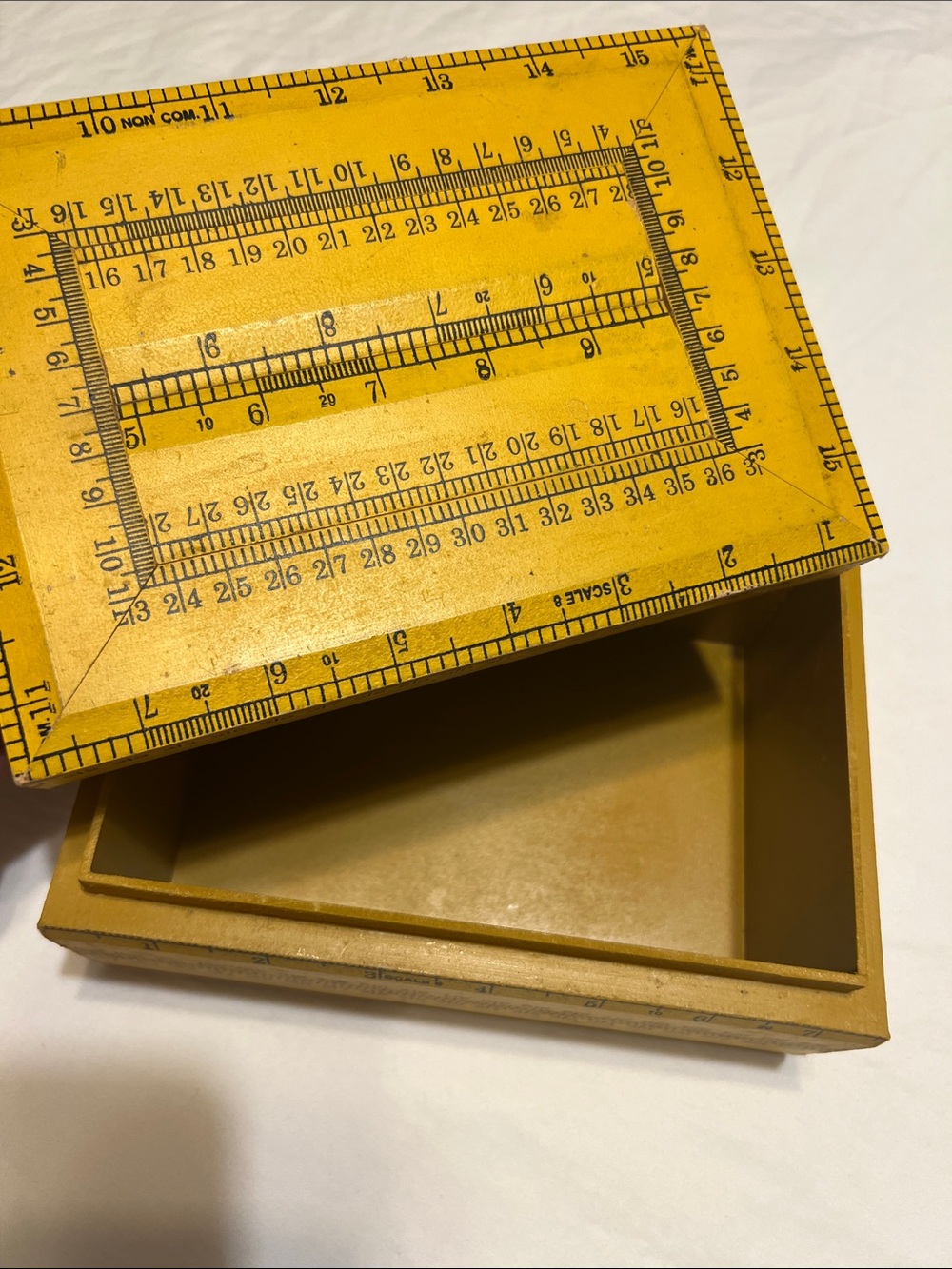 Yellow Decorative Storage Box with Ruler Design